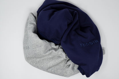 Grey and Navy blue variation of a sweatsuit top 